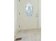 Bright entrance featuring a classic front door with decorative glass panel at 8008 N Alaska St, Tampa, FL 33604