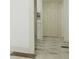 Bright hallway featuring clean lines and modern flooring at 8008 N Alaska St, Tampa, FL 33604