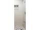 Tiled shower featuring a recessed soap nook at 8008 N Alaska St, Tampa, FL 33604