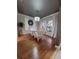 Elegant dining room featuring a decorative chandelier and wood flooring at 824 Greenbelt Cir, Brandon, FL 33510