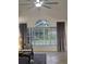 Bright living room featuring a large window with view and vaulted ceilings at 824 Greenbelt Cir, Brandon, FL 33510