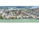 An aerial view shows the neighborhood and waterways surrounding the home at 8801 Gulf Blvd, St Petersburg, FL 33706