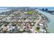 An aerial view shows the neighborhood and waterways surrounding the home at 8801 Gulf Blvd, St Petersburg, FL 33706