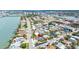 Aerial view of the neighborhood near the water, highlighting the house's proximity to the beach at 8801 Gulf Blvd, St Petersburg, FL 33706
