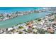An aerial view shows the neighborhood and waterways surrounding the home at 8801 Gulf Blvd, St Petersburg, FL 33706