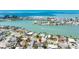 An aerial view shows the neighborhood and waterways surrounding the home at 8801 Gulf Blvd, St Petersburg, FL 33706