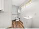 Bathroom with a toilet, vanity, and window at 8801 Gulf Blvd, St Petersburg, FL 33706