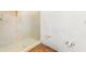Bathroom featuring a glass shower door and wood floors at 8801 Gulf Blvd, St Petersburg, FL 33706