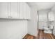 Bathroom featuring a toilet and overhead storage space at 8801 Gulf Blvd, St Petersburg, FL 33706