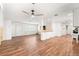 Open-concept living space featuring wood floors, plenty of natural light and an open floorplan at 8801 Gulf Blvd, St Petersburg, FL 33706