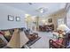 Comfortable living room and dining area offers an open floor plan and neutral colors at 965 Westwinds Blvd, Tarpon Springs, FL 34689