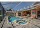 Sparkling screened pool and spa offering a private oasis for relaxation and enjoyment at 965 Westwinds Blvd, Tarpon Springs, FL 34689