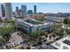 Aerial view of Townview Condominiums with city views and mature landscaping at 105 4Th Ne Ave # 219, St Petersburg, FL 33701