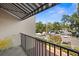 Balcony view showcasing outdoor seating, shade and neighborhood scenery at 105 4Th Ne Ave # 219, St Petersburg, FL 33701