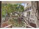 Balcony overlooking lush landscaping and serene courtyard at 105 4Th Ne Ave # 219, St Petersburg, FL 33701
