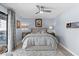 Cozy bedroom bathed in natural light with plush rug, lamps, and serene atmosphere at 105 4Th Ne Ave # 219, St Petersburg, FL 33701