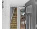 Entryway featuring tiled stairs leading up to the main living area, with tiled floors at 105 4Th Ne Ave # 219, St Petersburg, FL 33701