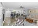 Stylish living room with updated kitchen and seamless flow at 105 4Th Ne Ave # 219, St Petersburg, FL 33701