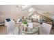 Spacious bonus room featuring a vaulted ceiling, versatile layout, and ample natural light at 10600 Indian Hills Ct, Seminole, FL 33777