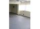 Unfinished basement with a large window allowing for natural light at 11906 Lagoon Ln, Treasure Island, FL 33706