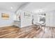 Bright dining area features wood floors, white walls and trim, and a modern dining table at 12536 116Th St, Largo, FL 33778