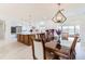 Elegant dining area connects to the kitchen, bathed in natural light, and perfect for Gathering gatherings at 13797 Pinecrest Dr, Largo, FL 33774