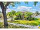 Beautiful single-story home featuring lush landscaping and a well-maintained green lawn at 1418 Hurley Pond Ln, Valrico, FL 33596