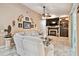 Comfortable living room with a fireplace, television, and decorative wall accents at 16608 Meadow Cove St, Tampa, FL 33624