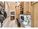 Inviting home office with built-in cabinetry, shelving, and ample workspace at 16608 Meadow Cove St, Tampa, FL 33624