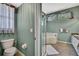 Bathroom featuring toilet, bathtub, and shower at 17364 Mediterranean Cir, Weeki Wachee, FL 34614