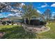 Well-maintained home with lush landscaping and a beautifully manicured lawn at 17364 Mediterranean Cir, Weeki Wachee, FL 34614