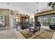 Spacious living room with neutral tones and a view into the dining area at 17364 Mediterranean Cir, Weeki Wachee, FL 34614