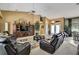 Bright living room boasting tall ceilings, comfortable seating, and great natural light at 17364 Mediterranean Cir, Weeki Wachee, FL 34614