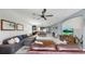 Inviting living room flows seamlessly into the kitchen and dining area, offering ample natural light at 17740 Bright Wheat Dr, Lithia, FL 33547