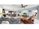 Spacious open-concept layout with living room, dining area, and kitchen perfect for modern living at 17740 Bright Wheat Dr, Lithia, FL 33547