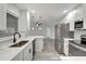 Updated kitchen featuring white countertops, stainless steel appliances, and sleek cabinetry at 1968 Rolling Green Cir, Sarasota, FL 34240