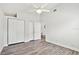 Bright bedroom with hardwood floors, a large closet, and access to the house with neutral walls at 2291 Americus W Blvd # 41, Clearwater, FL 33763