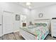 Comfortable bedroom with a queen bed and an en-suite bathroom at 2291 Americus W Blvd # 41, Clearwater, FL 33763