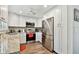 Updated kitchen boasts stainless steel appliances, granite countertops, and ample cabinet space at 2291 Americus W Blvd # 41, Clearwater, FL 33763