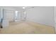 Bright bedroom boasts neutral tones, ceiling fan, and ample closet space at 3204 40Th S Way # B, St Petersburg, FL 33711