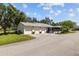 Well-maintained home featuring a multi-car garage and landscaped surroundings at 3204 40Th S Way # B, St Petersburg, FL 33711