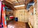 Organized shed interior featuring shelving, ample storage space, and convenient accessibility at 3240 Sand Key Dr, Palm Harbor, FL 34684