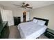 Comfortable bedroom featuring a ceiling fan, neutral walls, and a closet at 3305 Haviland Ct # 301, Palm Harbor, FL 34684