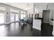 The bright and airy community clubhouse interior with ample seating and kitchenette at 3305 Haviland Ct # 301, Palm Harbor, FL 34684