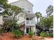 Inviting condominium with well-maintained landscaping and charming second-story balcony at 3305 Haviland Ct # 301, Palm Harbor, FL 34684