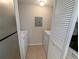 Functional laundry closet with side-by-side washer and dryer units for convenience at 3305 Haviland Ct # 301, Palm Harbor, FL 34684