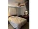 Bedroom featuring a ceiling fan, a double bed and a wooden vanity at 4237 Tamargo Dr # 4237, New Port Richey, FL 34652