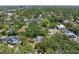 A high angle shot of a neighborhood, filled with lush trees and well-spaced houses at 4315 W Azeele St, Tampa, FL 33609