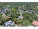 A neighborhood with lots of trees providing shade, featuring lush landscaping and beautiful homes at 4315 W Azeele St, Tampa, FL 33609