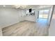 Open-concept space connects the living room to the updated kitchen, with plenty of natural light at 4518 W Minnehaha St, Tampa, FL 33614